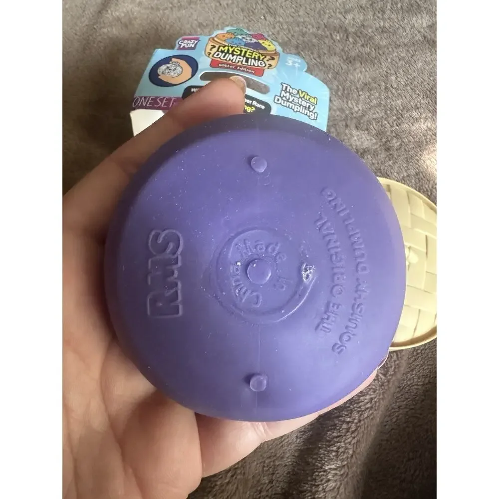 Crazy Fun Mystery Dumpling Gold Glitter Edition Blind Pack Squishy Open Purple